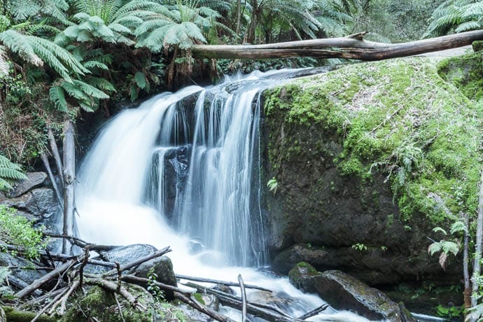 Ampitheatre Falls landscape photo hitting rocks with lots of power