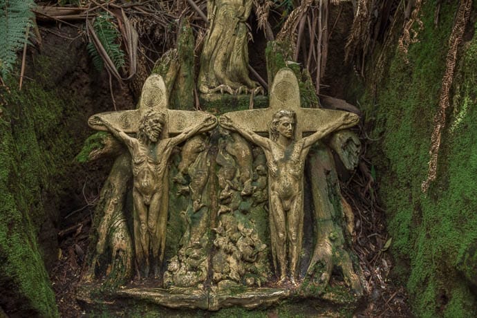 William Ricketts and an aboriginal sculpted on a cross